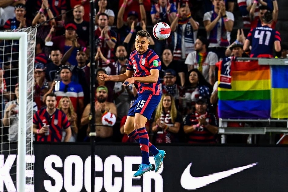 Team USA's Aaron Long jumps for the ball during US Men’s National Team’s 2022 FIFA World Cup Qualifier vs. Panama at Exploria Stadium in Orlando, Florida, on March 27, 2022.