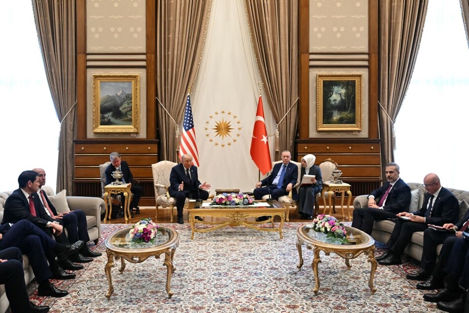 Turkish President Recep Tayyip Erdogan (C-R) and US President Donald Trump (C-L) hold a meeting at Bestepe Presidential Compound in Ankara on Tuesday.