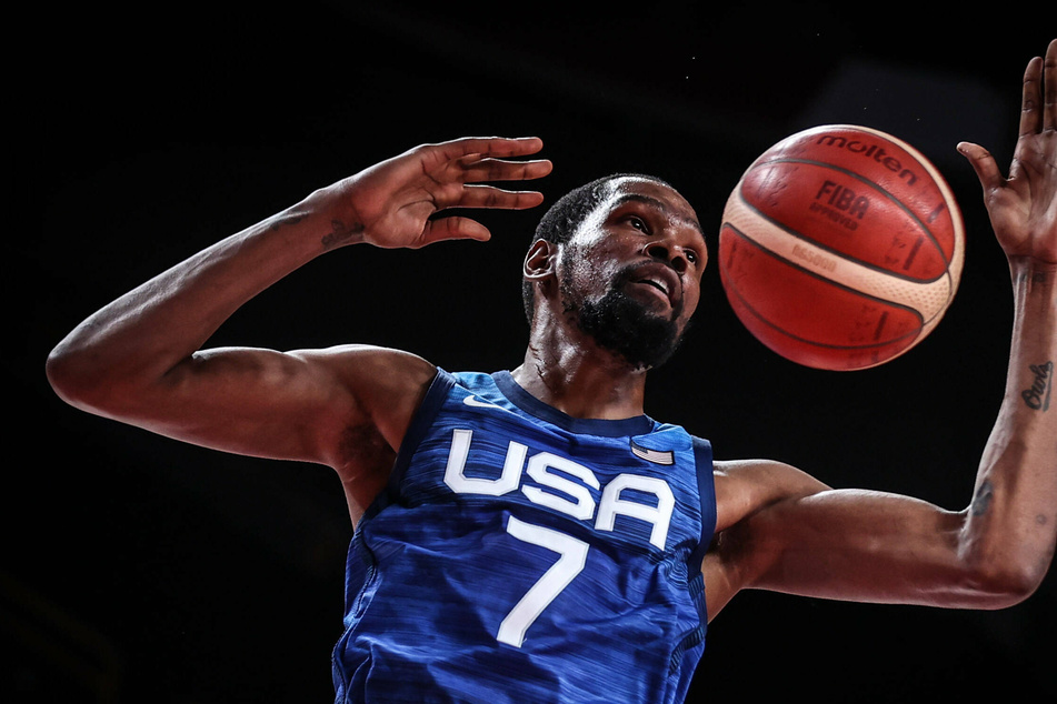 Olympics: US survive scare to down Spain in basketball quarters and set up rematch with Aussies