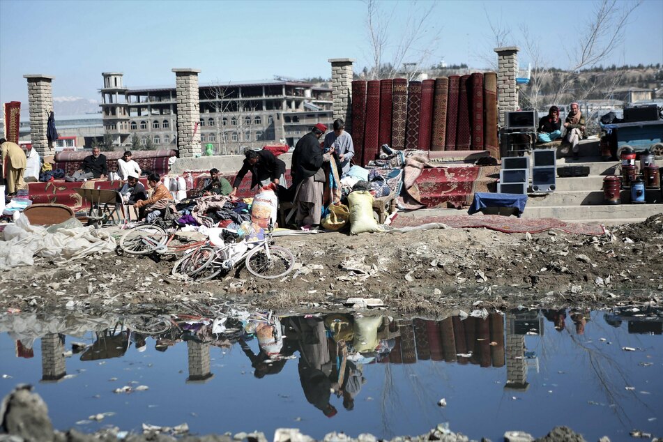 Biden to split Afghanistan's money between 9/11 victims and aid organizations