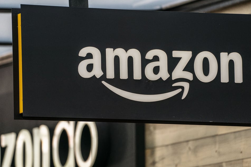 A sign is pictured outside of an Amazon Go store at the Amazon.com Inc. headquarters in Seattle, Washington.