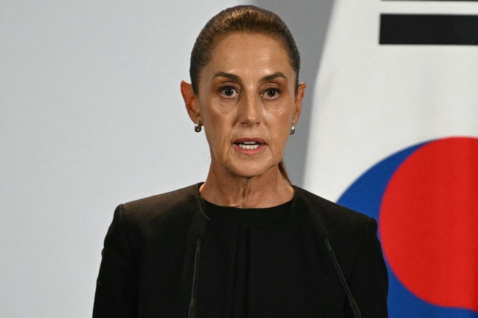 Mexico's President Claudia Sheinbaum speaks during a briefing at Palacio Nacional in Mexico City on Thursday. Sheinbaum said Mexico would boost imports from the US, appeasing a big demand from Trump.