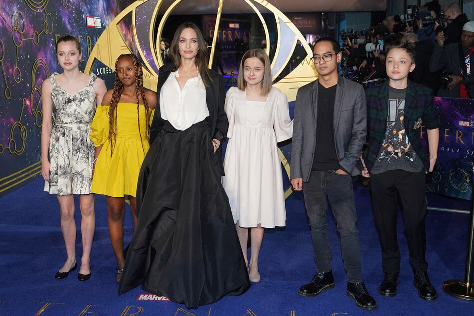The children have all stood closely by Angelina (center l) amid tension with their famous father.