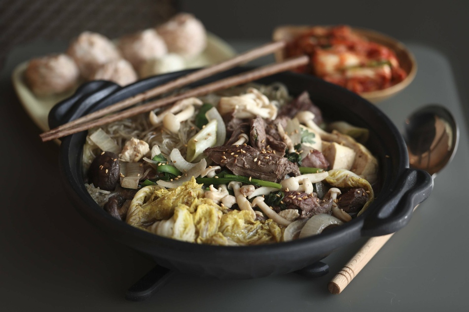 Male models stir controversy at (un)traditional Chinese hotpot restaurant