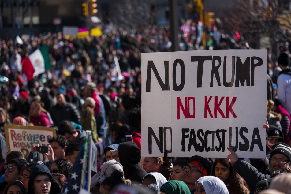 Protesters gather at the Milwaukee County Courthouse in Wisconsin in opposition to Donald Trump's anti-immigrant policies.
