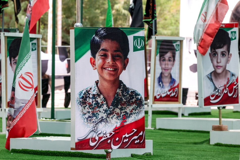 The graves of people and children killed during the US strike on the Shajareh Tayebeh primary school are pictured at a cemetery in Minab in Iran’s Hormozgan province.