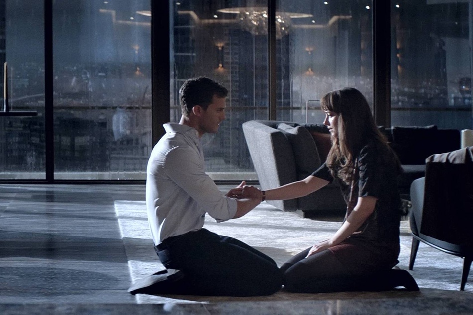 Jamie Dornan (l) and Dakota Johnson (r) tackle the darker side of love as the iconic characters Christian Grey and Ana Steele in the Fifty Shades of Grey franchise.