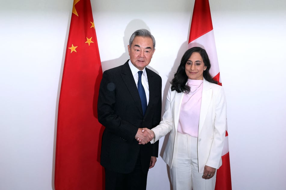 Canada's Minister of Foreign Affairs Anita Anand (r.) shakes hands with China's Minister of Foreign Affairs Wang Yi ahead of a bilateral meeting in Ottawa on May 29, 2026.