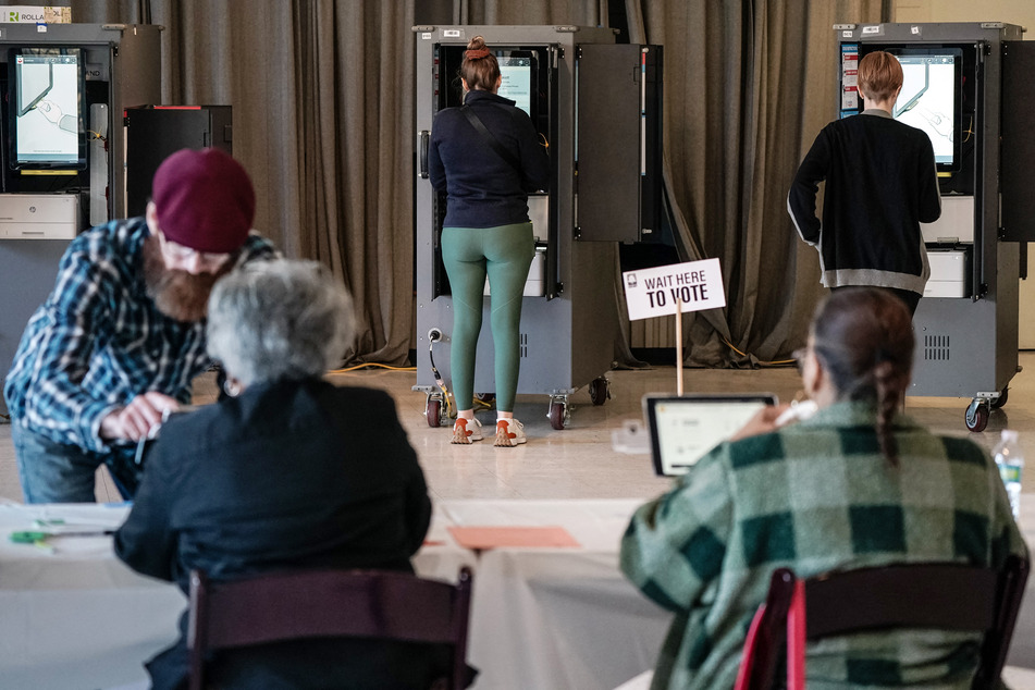 Voters cast their ballots during the Georgia presidential primary elections in Atlanta, Georgia, on Tuesday.