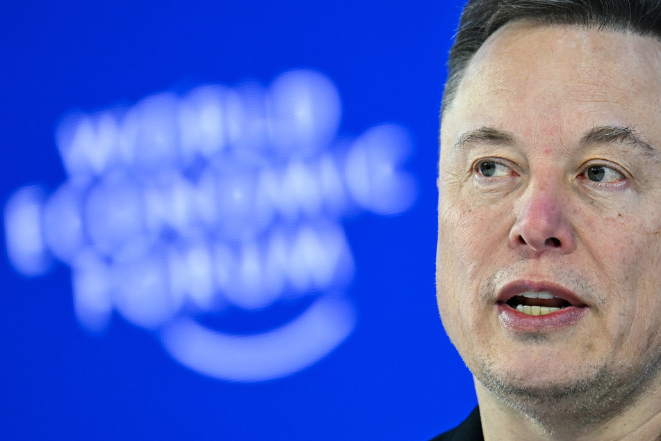 Elon Musk promises humanoid robots for all at Davos debut