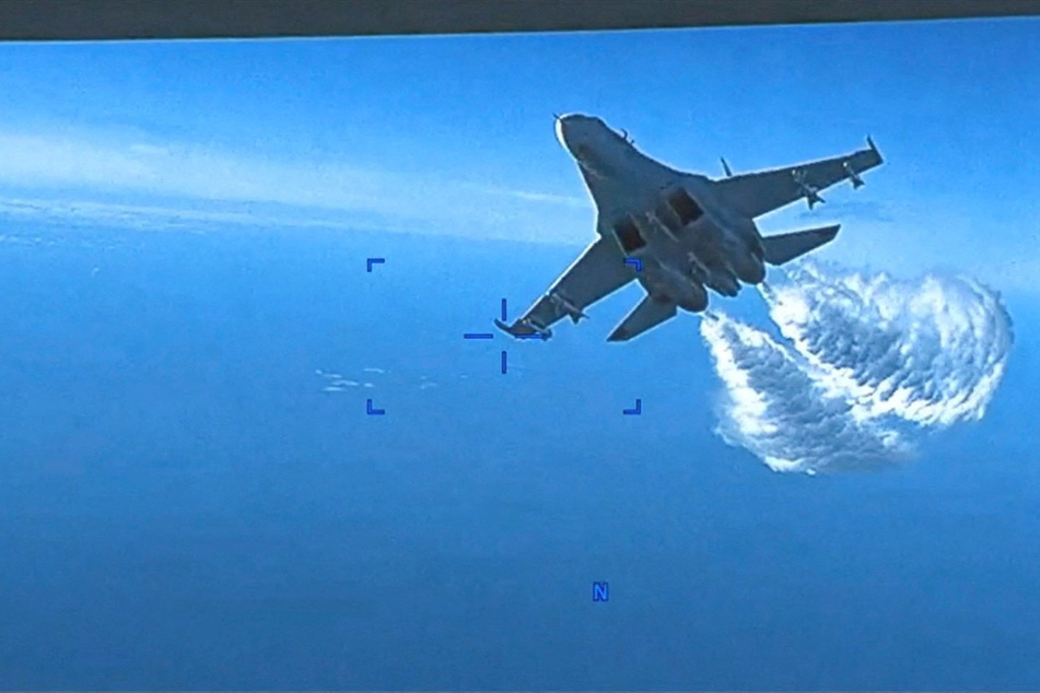 Dramatic video of incident between US drone and Russian jet released