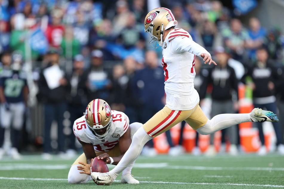 Eddy Pineiro of the San Francisco 49ers kicks a field goal against the Seattle Seahawks during the fourth quarter at Lumen Field.