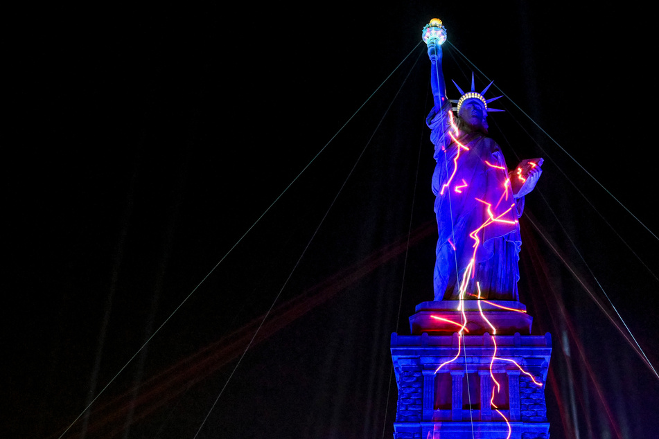 Statue of Liberty gets dazzling techno makeover for America's 250th anniversary