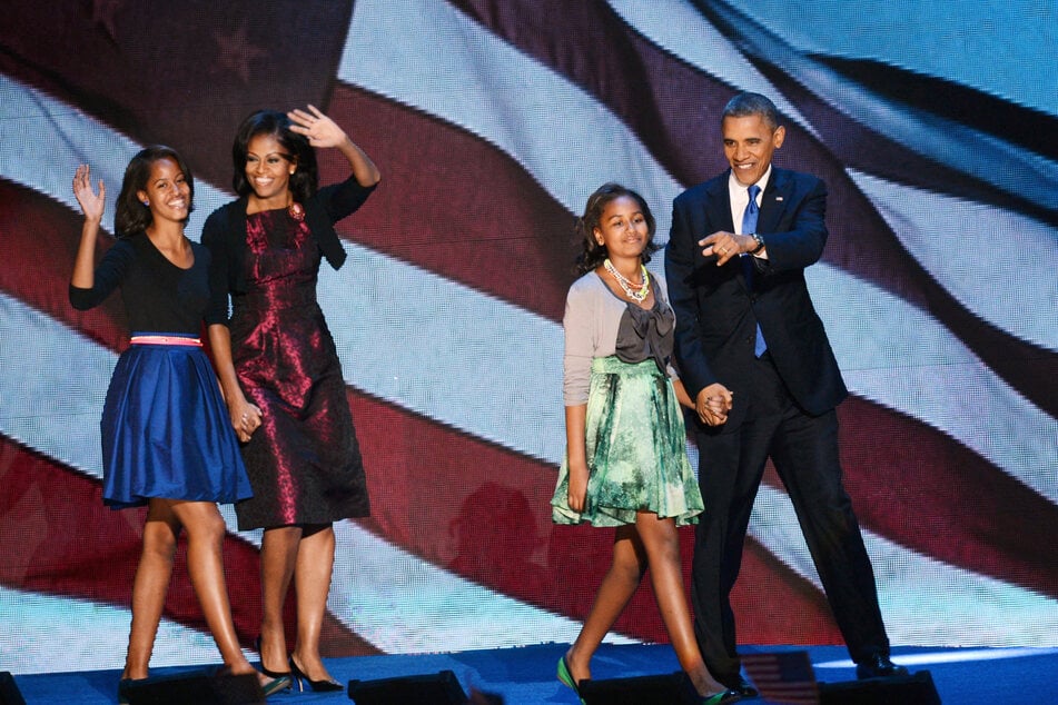 The photo shows the Obamas one day after Barack Obama (r) was elected president for the second time in 2012.