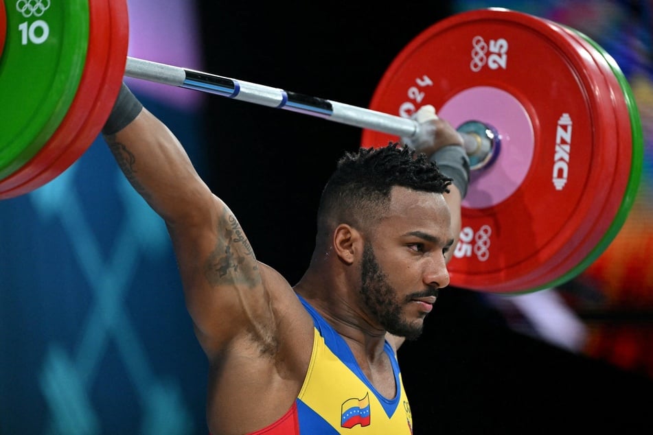 Venezuelan weightlifting silver medalist Julio Mayora helped rescue people after his country's devastating dual earthquakes by lifting debris.