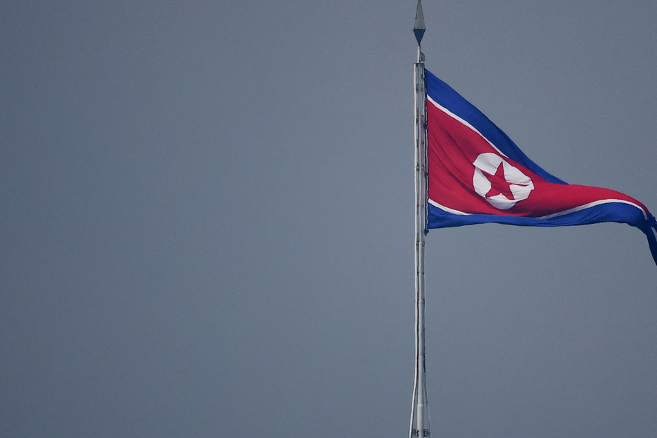 North Korea warns of more "offensive action" after ballistic missile launch