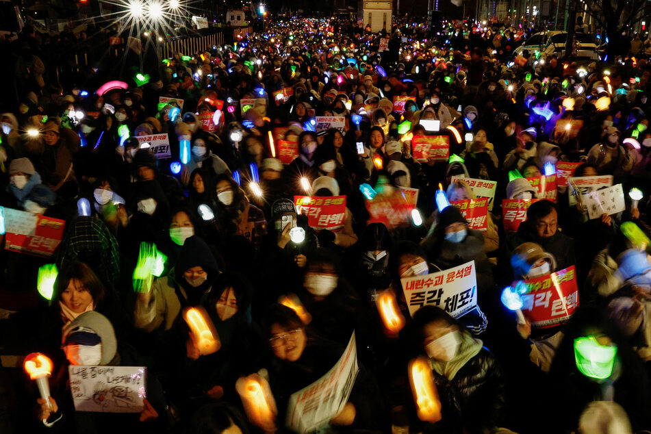 Protesters attend a rally calling for the impeachment of South Korean President Yoon Suk Yeol near the National Assembly in Seoul.