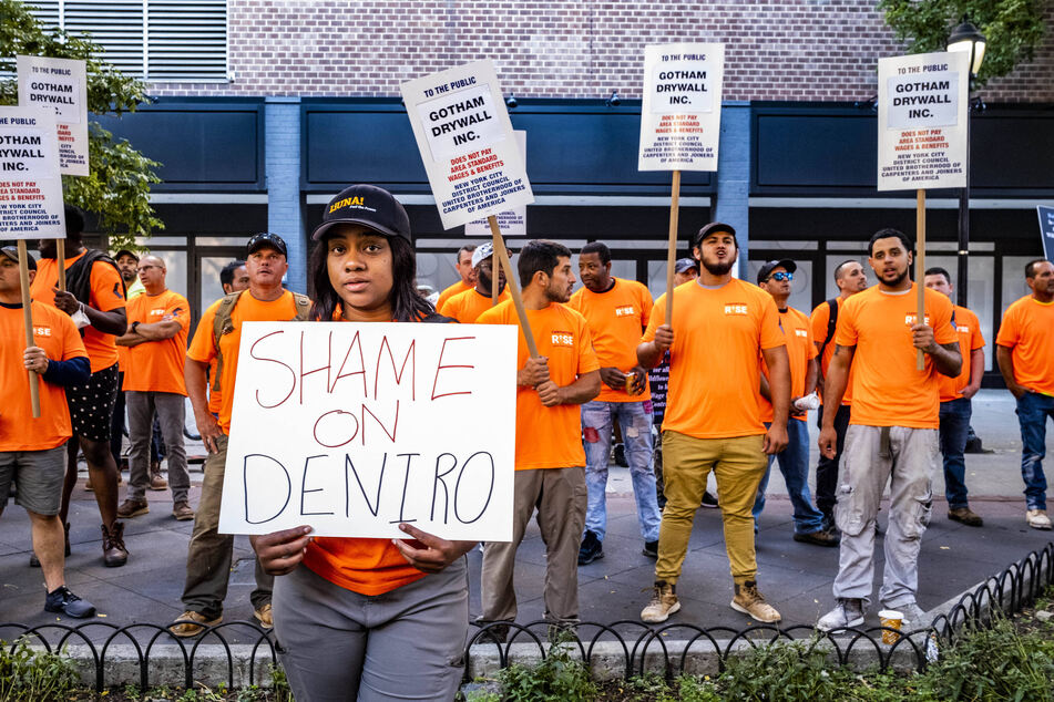 Workers from Local 79 Construction & General Building Laborers Union picket across from Robert De Niro's Tribeca Film Center in June.