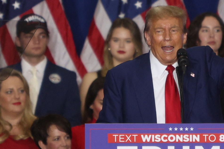 Trump doubles down on anti-migrant rhetoric in "bloodbath" reprisal