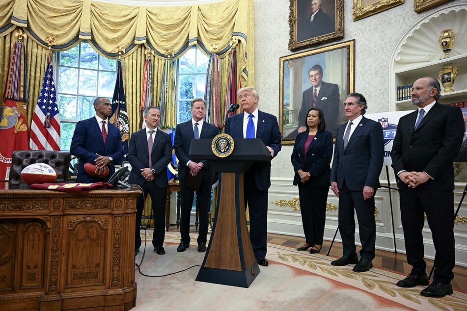US President Donald Trump joined by (L-R) White House Opportunity and Revitalization Council Executive Director Scott Turner, Washington Commanders owner Josh Harris, NFL Commissioner Roger Goodell, DC Mayor Muriel Bowser and US Secretary of the Interior Doug Burgum, announces that Washington, DC, will host the 2027 NFL Draft, during an event in the Oval Office of the White House in Washington, DC, on Monday.