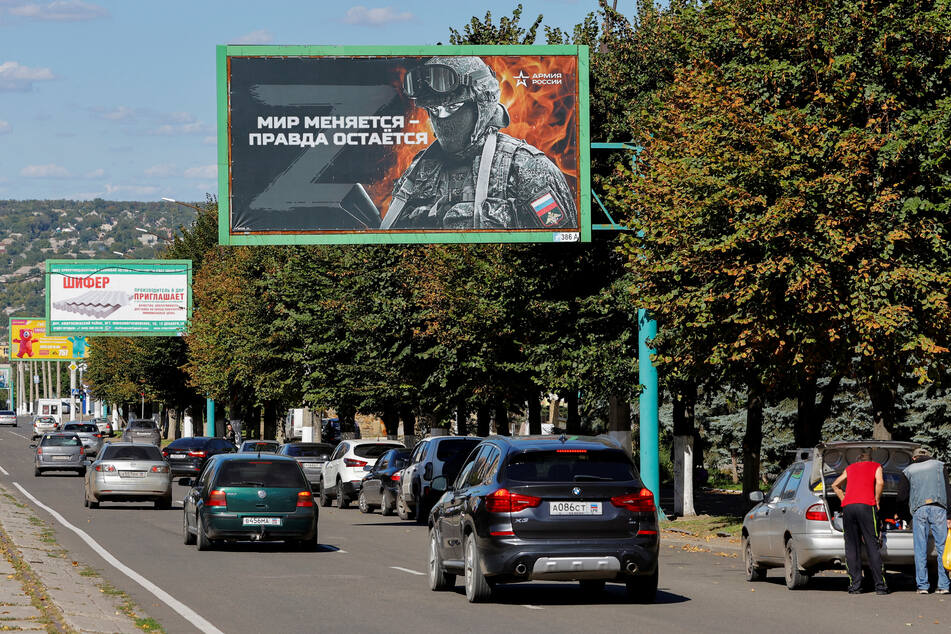 Pro-Russian billboards in Luhansk, which will hold a referendum to join Russia next week.
