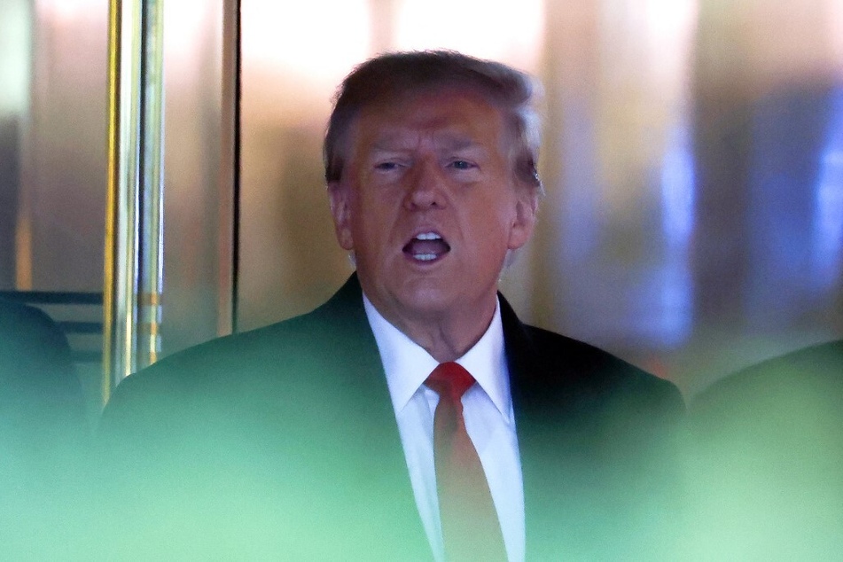 Donald Trump leaves Trump Tower for Manhattan federal court to attend his defamation trial in New York City.