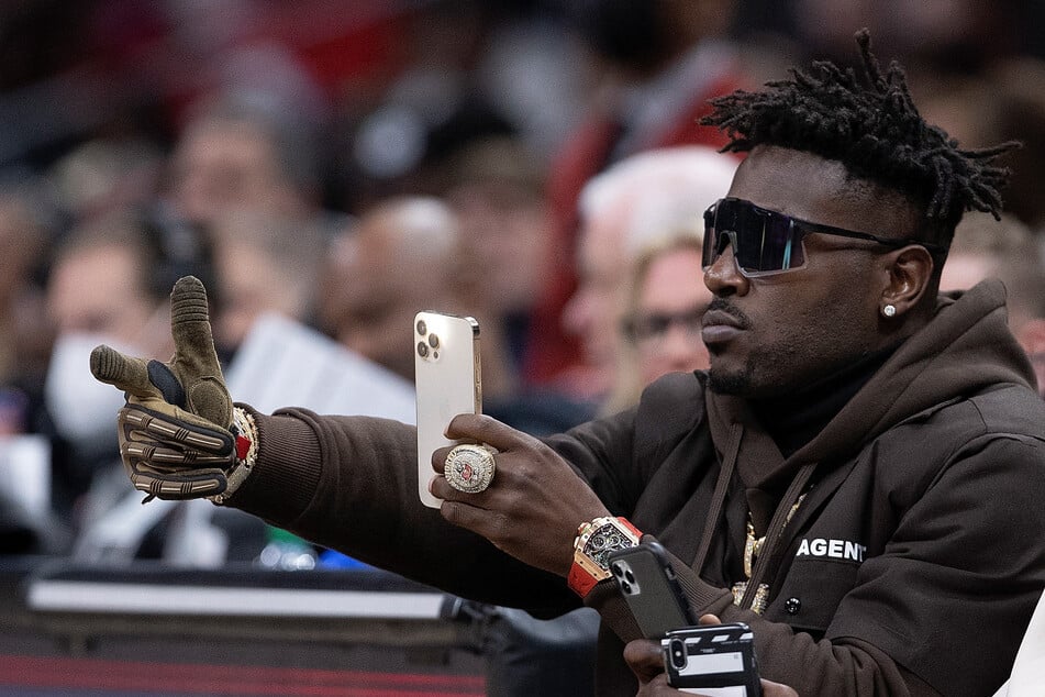 Antonio Brown looks on during the game between the Atlanta Hawks and the Los Angeles Clippers on March 11, 2022. The former NFL star will accept a plea deal in his attempted murder case.