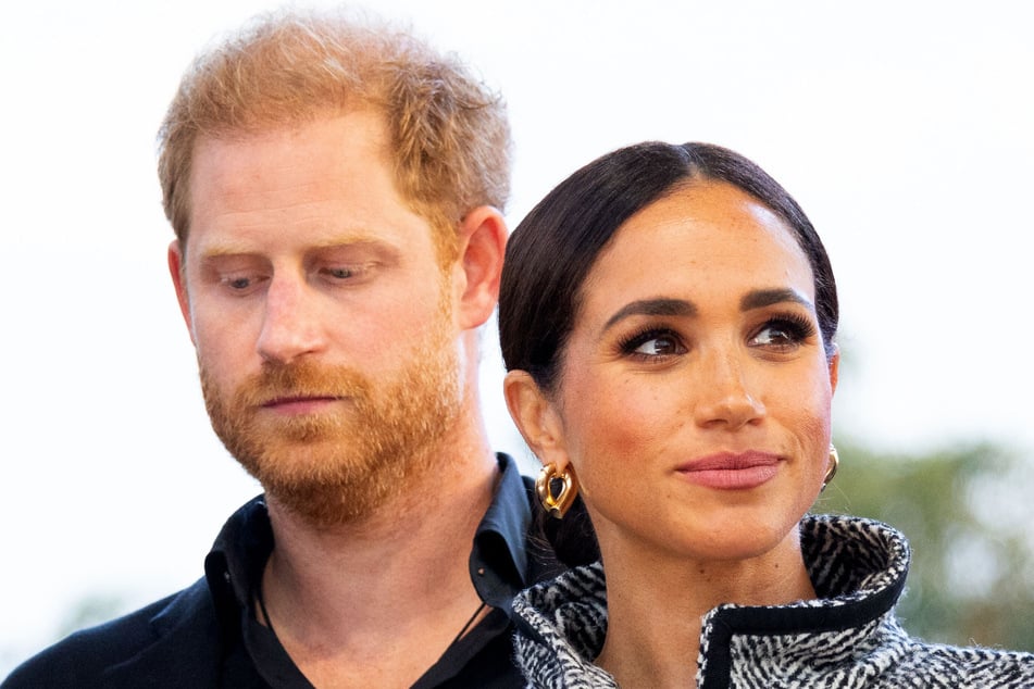 Prince Harry (l.) and Meghan Markle are said to be in disagreement over where to spend the Christmas holiday.