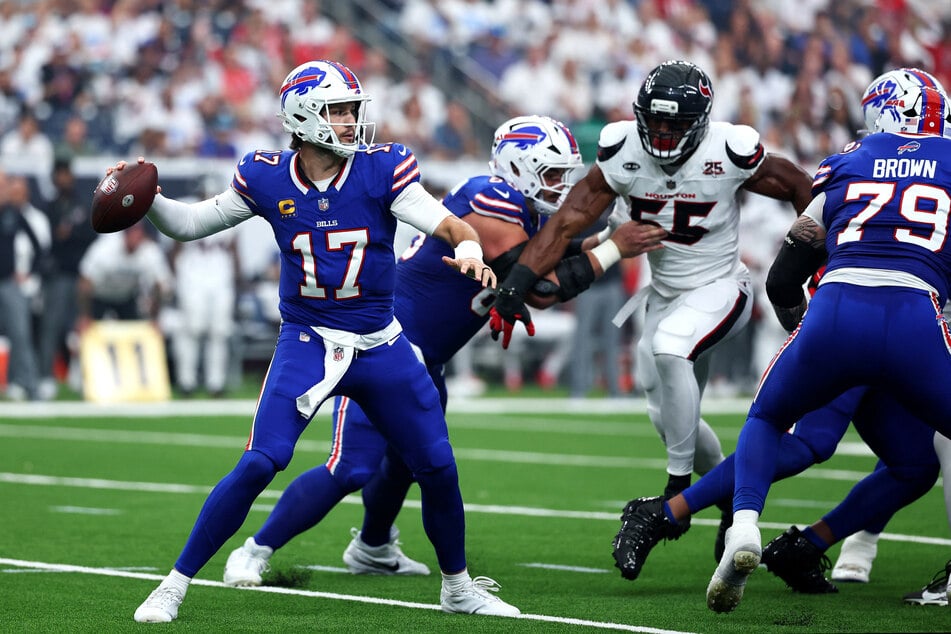 Buffalo Bills quarterback Josh Allen drops back for a pass during the first quarter against the Houston Texans at Reliant Stadium.