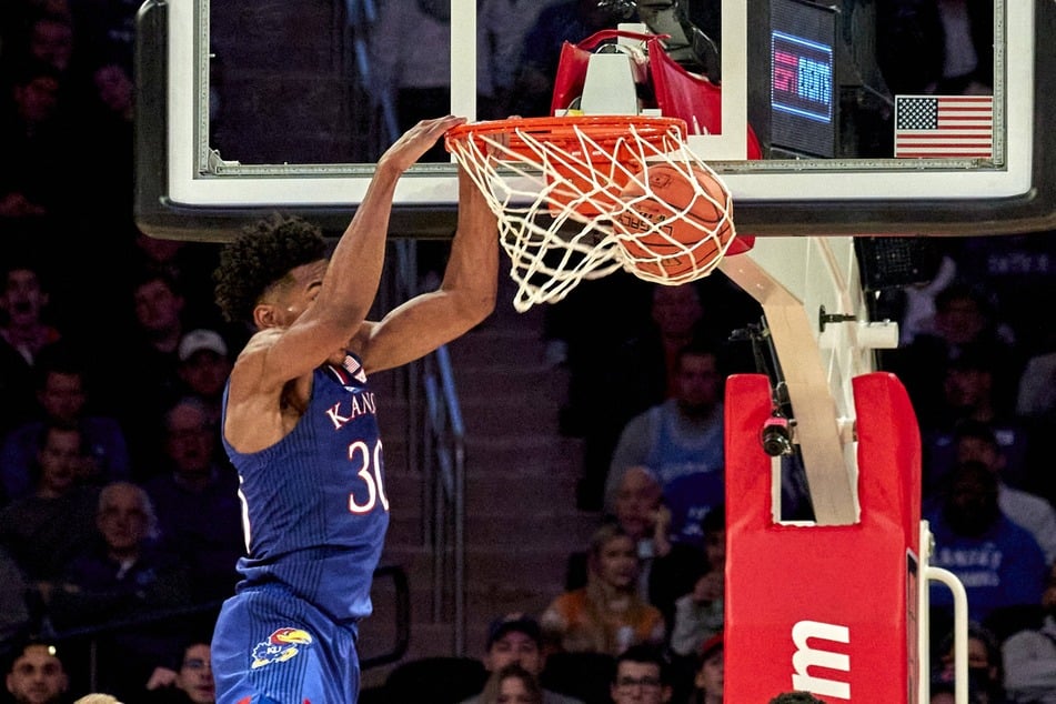 Jayhawks guard Ochai Agbaji scored a game-high 25 points against the Texans.