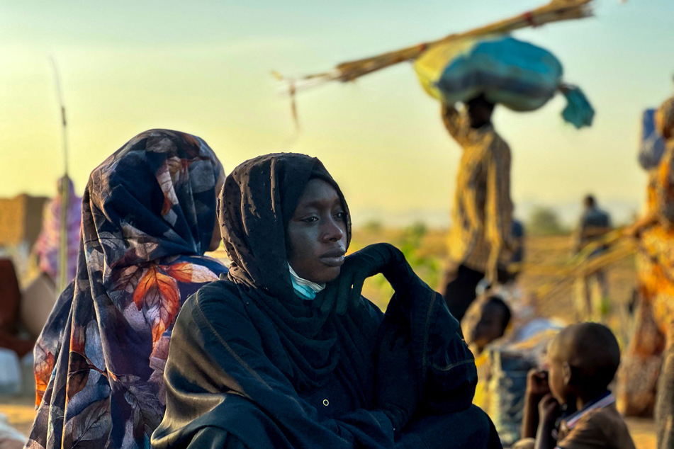 A displaced woman rests in Tawila, in the country's western Darfur region, on October 28, 2025, after fleeing El-Fasher following the city’s fall to the Rapid Support Forces.