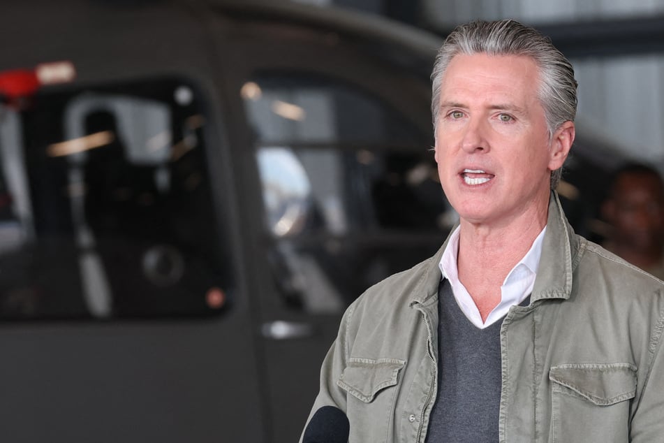 California Governor Gavin Newsom speaks at Montgomery-Gibbs Executive Airport on February 2. On Monday, Newsom declared a state of emergency across California to mobilize storm resources.