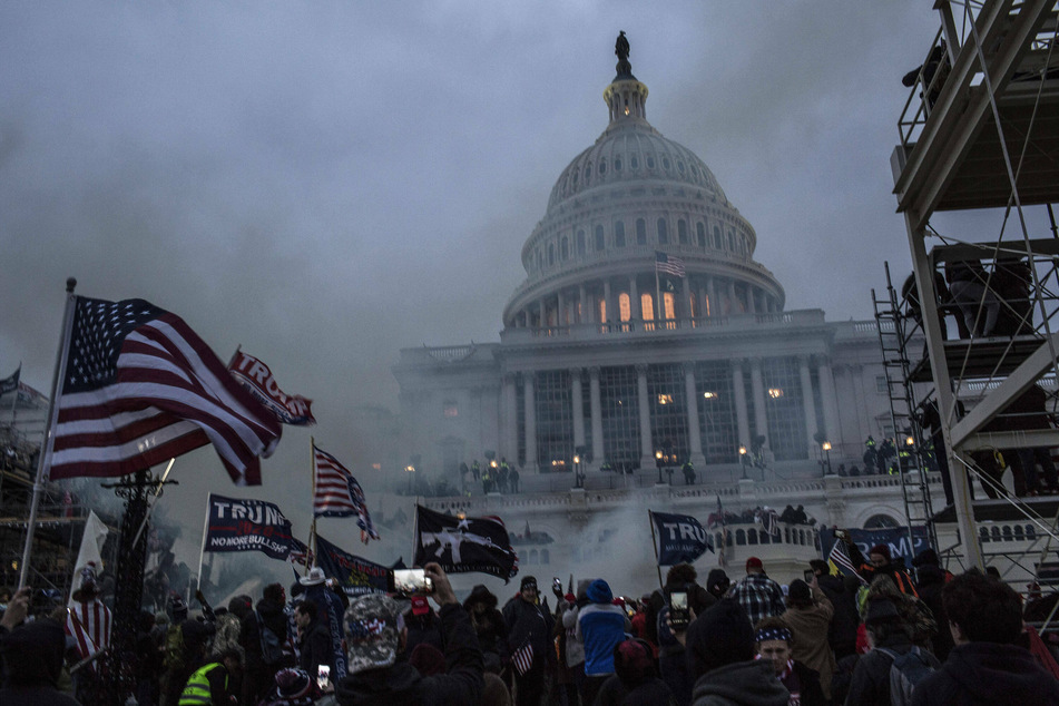 Pro-Trump protesters storm US Capitol, forcing Congress to halt session