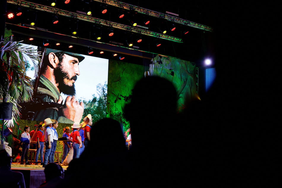 People attend a show in Havana paying tribute to the late Cuban President Fidel Castro as the country marks what would have been his 100th birthday.