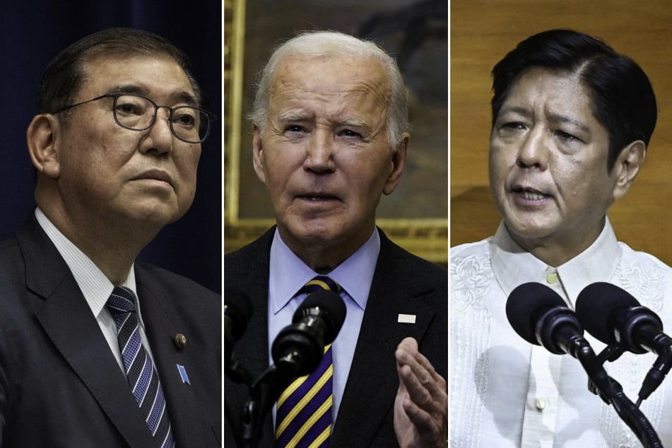 US President Joe Biden (c.) is scheduled to hold a trilateral phone call with Japanese Prime Minister Shigeru Ishiba (l.) and Philippine President Ferdinand Marcos.