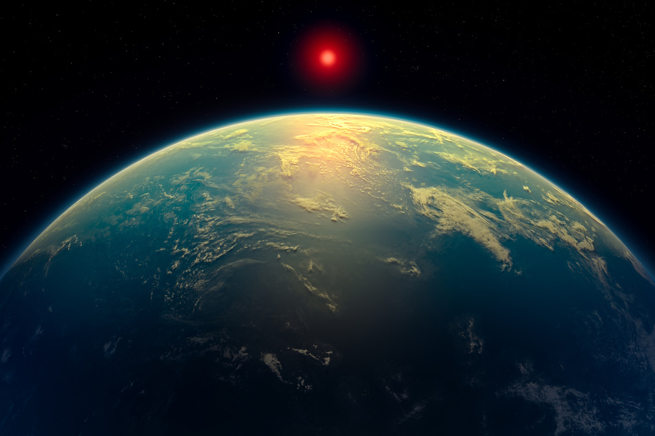 A handout artist's impression released on Thursday by N. Madhusudhan/University of Cambridge, shows the K2-18b super-Earth, a hycean world where astronomers say they have found the strongest yet "hints" of the life outside our solar system.