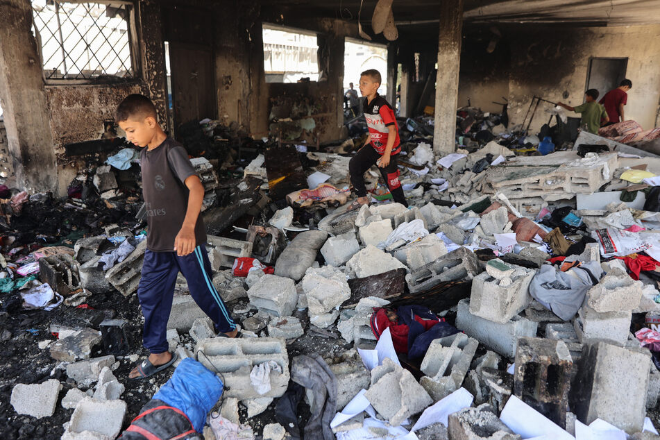 Palestinians reel from Israeli strike on Gaza school-turned-shelter: "This is not life"