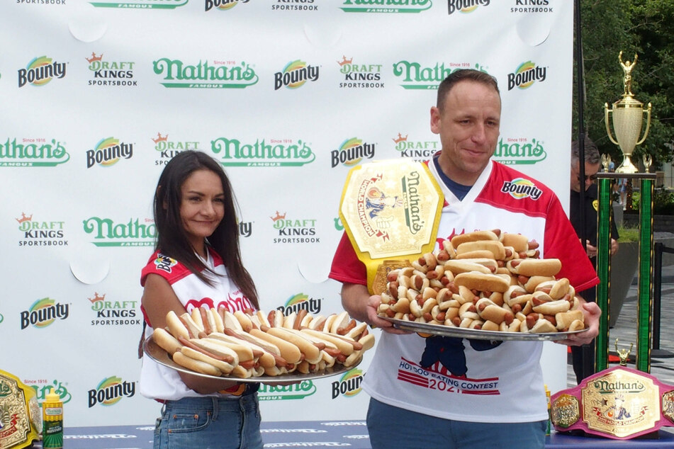 Joey Chestnut breaks own world record to win US Hot Dog Eating Contest