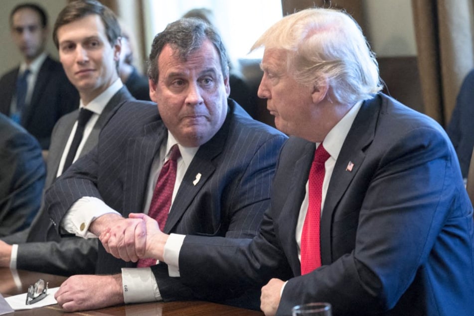 President Donald Trump (r.) shakes hands with New Jersey Governor Chris Christie in the Roosevelt Room of the White House on March 29, 2017 in Washington, DC.