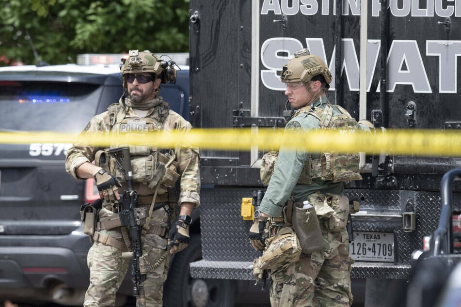 SWAT team hunts down suspect who stole a police car in a wild escape