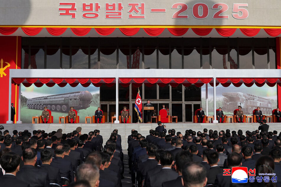 North Korean leader Kim Jong Un speaks during the Defense Development 2025 military exhibition event in Pyongyang ahead of the 80th founding anniversary of the Workers' Party, in this picture released October 5, 2025.