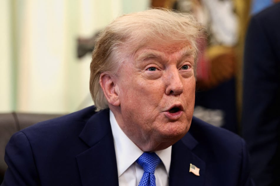 President Donald Trump attends an event to sign executive orders in the Oval Office at the White House on August 6, 2026.