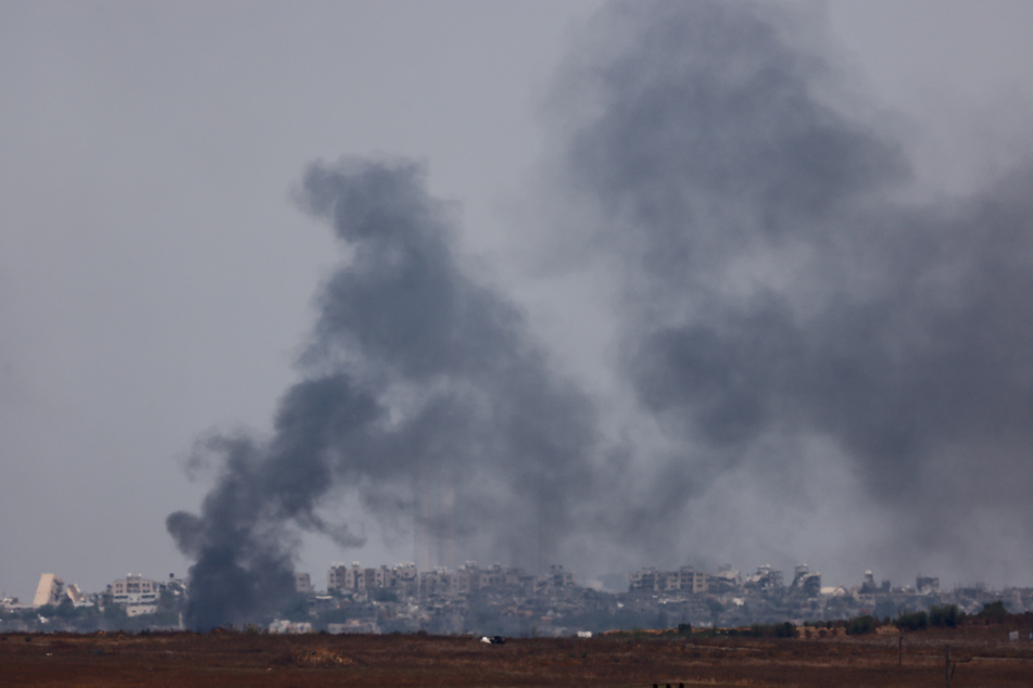 Smoke rises from Gaza amid ongoing Israeli bombardment.