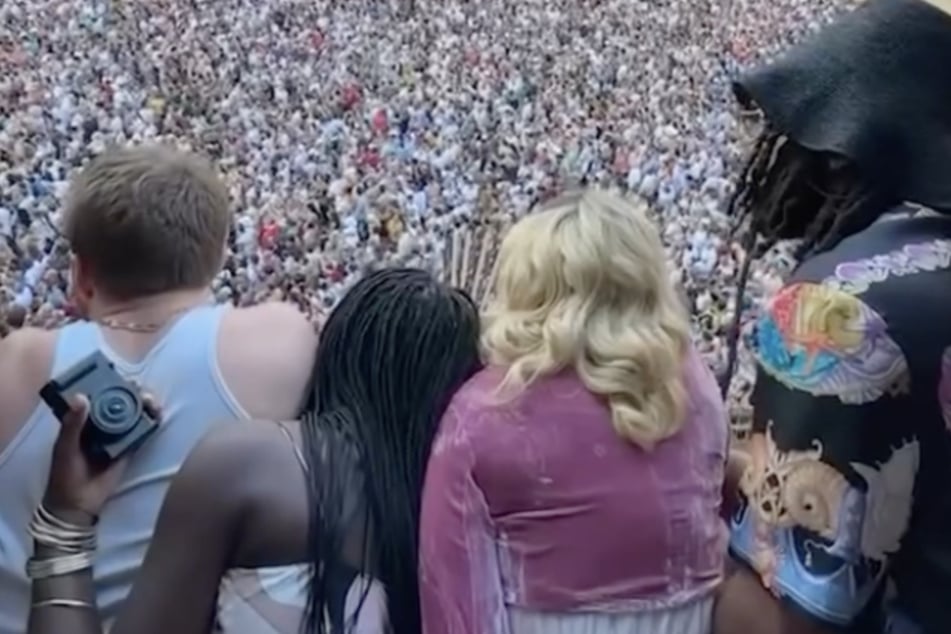 Madonna and her family had an excellent view of the horse race.