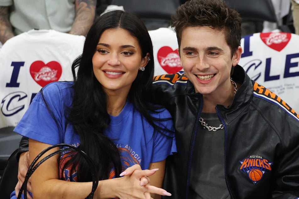 Kylie Jenner (l.) and Timothée Chalamet attend Game Four of the NBA Eastern Conference Finals at Rocket Arena on May 25. The couple has been together since 2023.
