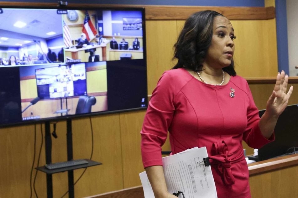 Trump trial DA Fani Willis defends "secret relationship" in heated courtroom drama