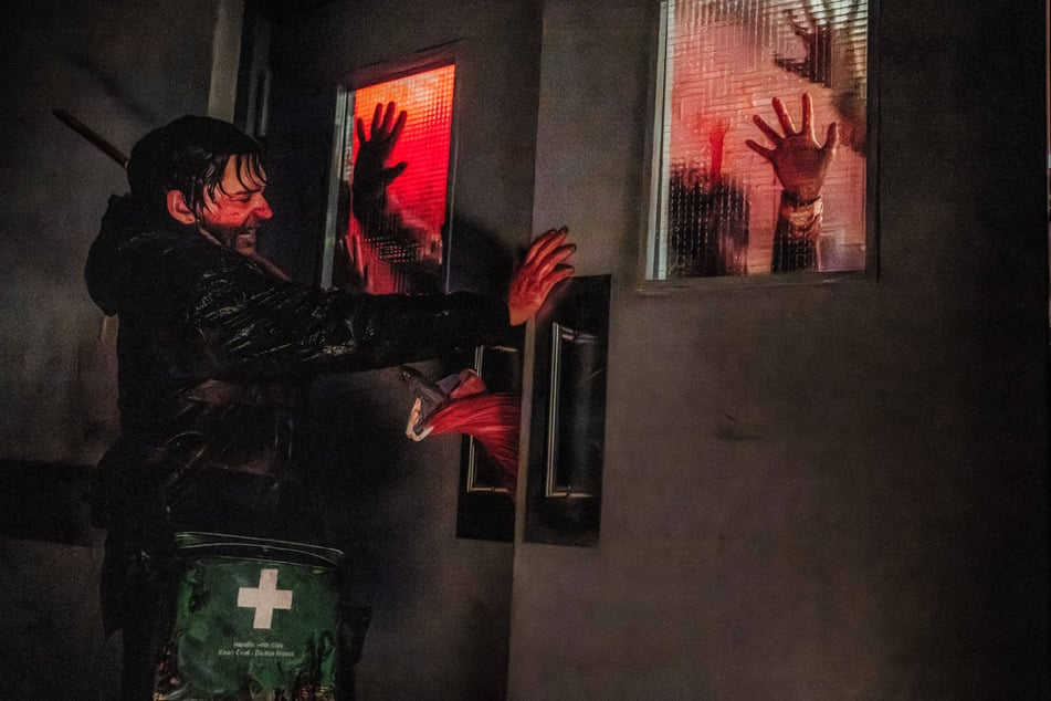 Austin Abrams plays Bryan, a medical courier living through a terrifying viral outbreak, in the new Resident Evil movie. The latest adaptation will lean more into horror than its more action-focused predecessors.