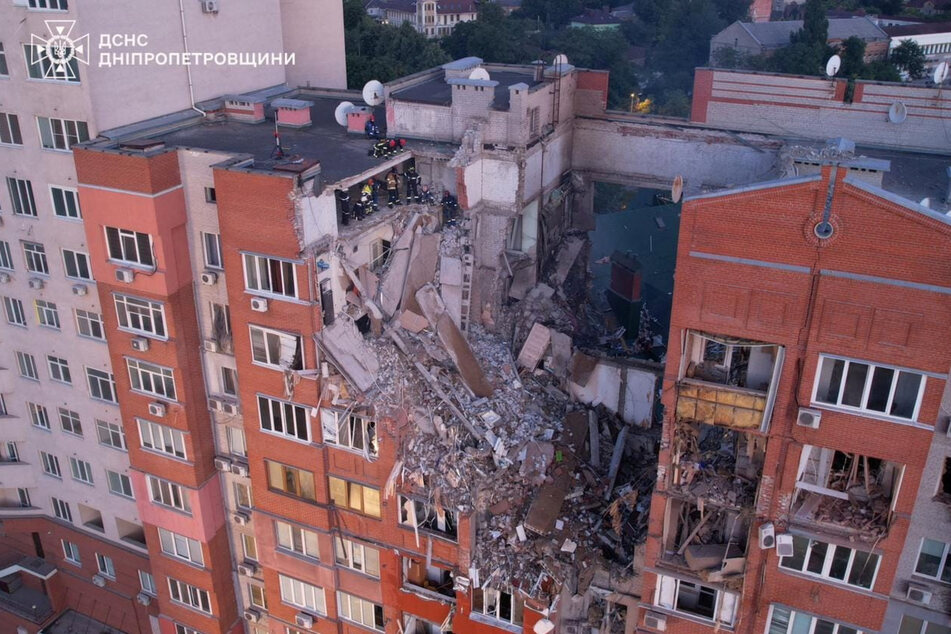 In the central city of Dnipro, police said they found a woman who was killed in an attack a day earlier that also wounded 13 people.