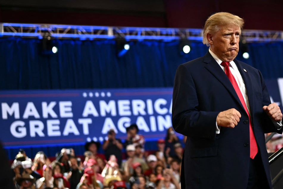 President Donald Trump dances after speaking during a midterm campaign rally at Lubbock Memorial Civic Center in Lubbock, Texas on October 27.