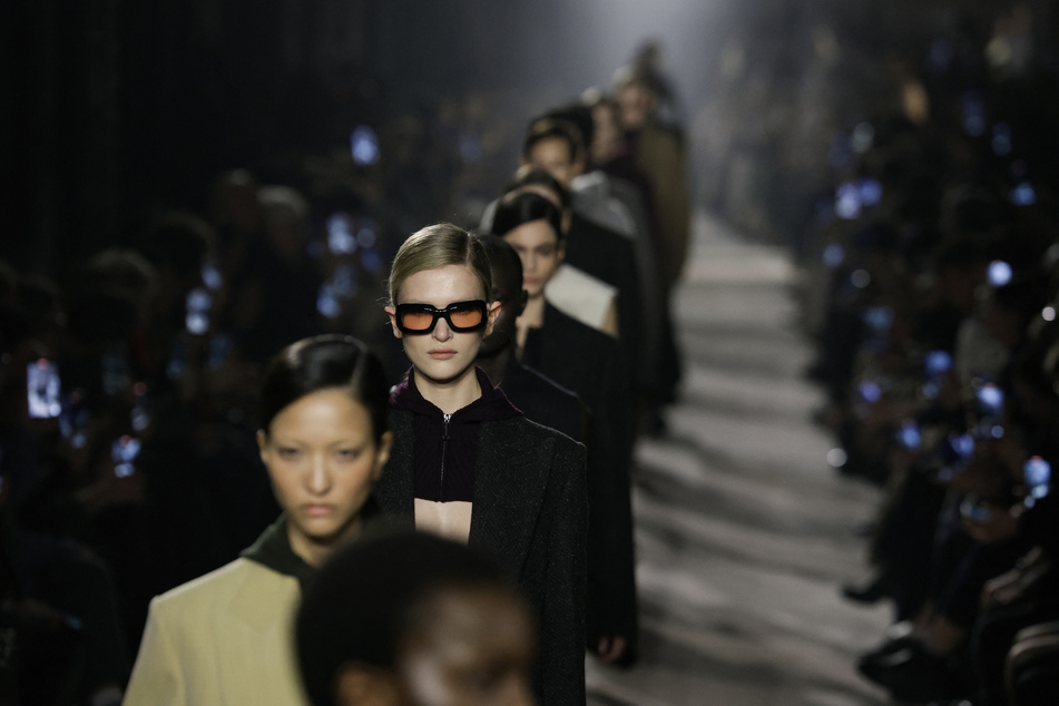 Models receive applause at the end of a presentation by Victoria Beckham for the Womenswear Ready-to-wear Fall-Winter 2025/2026 collection as part of Paris Fashion Week on March 7, 2025.